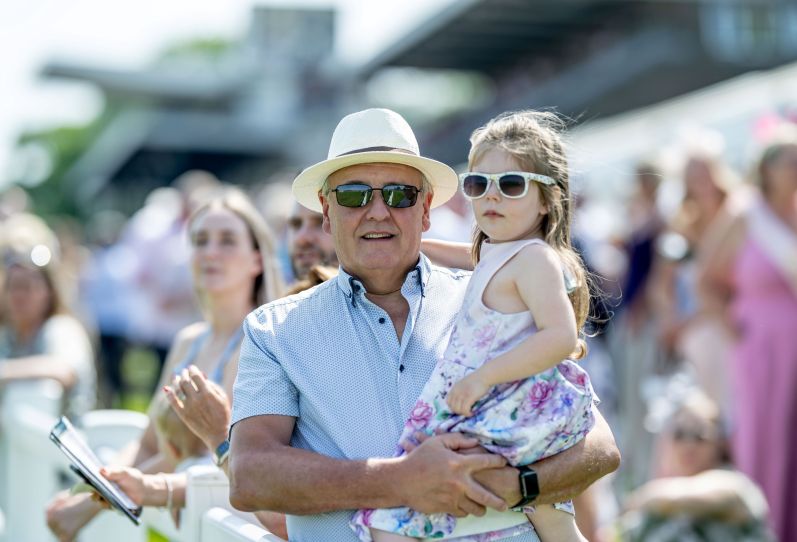 Racegoers watching the horses